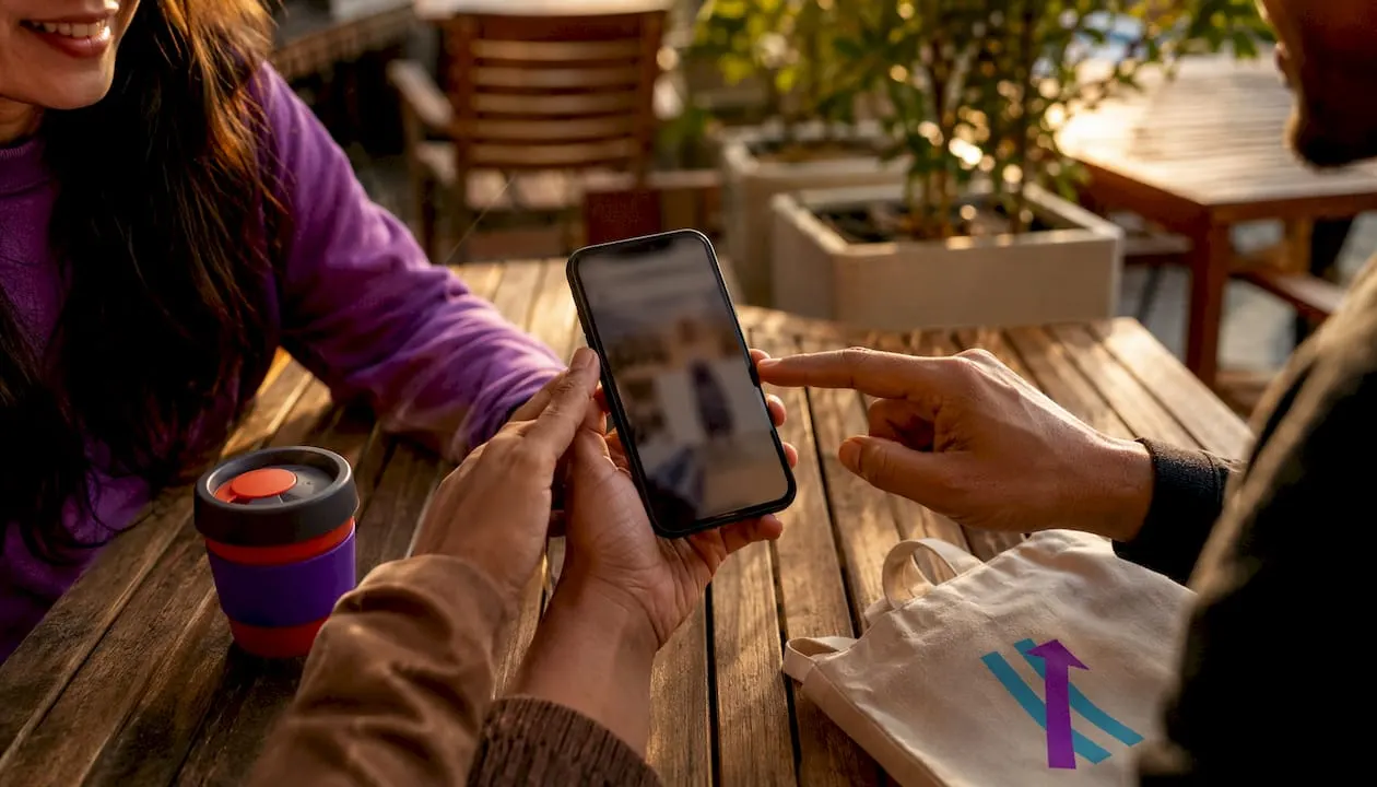 Person scrolling short videos outdoors on smartphone