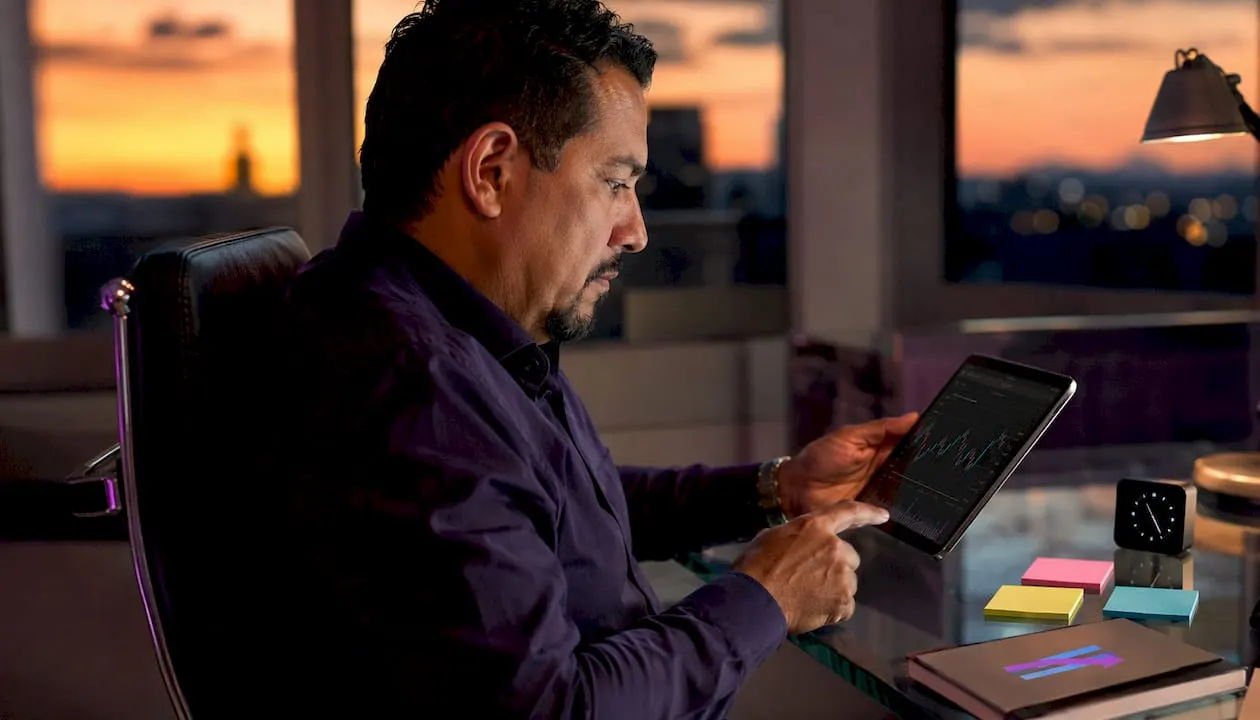 Trader reviewing risk controls for algo trading
