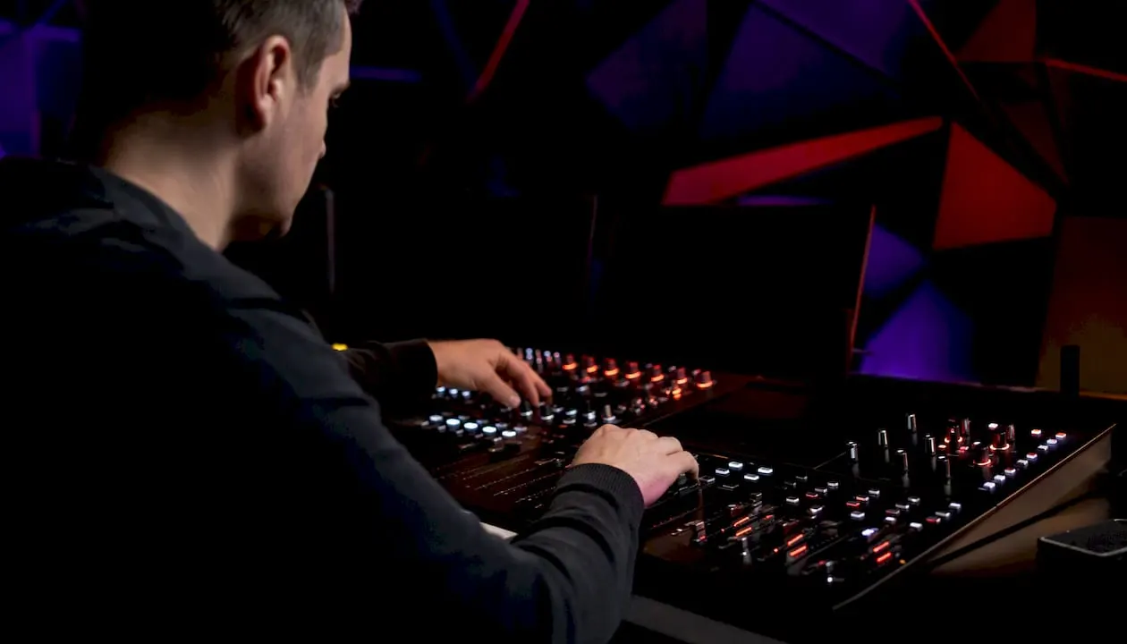 Trader adjusting dials on control panel