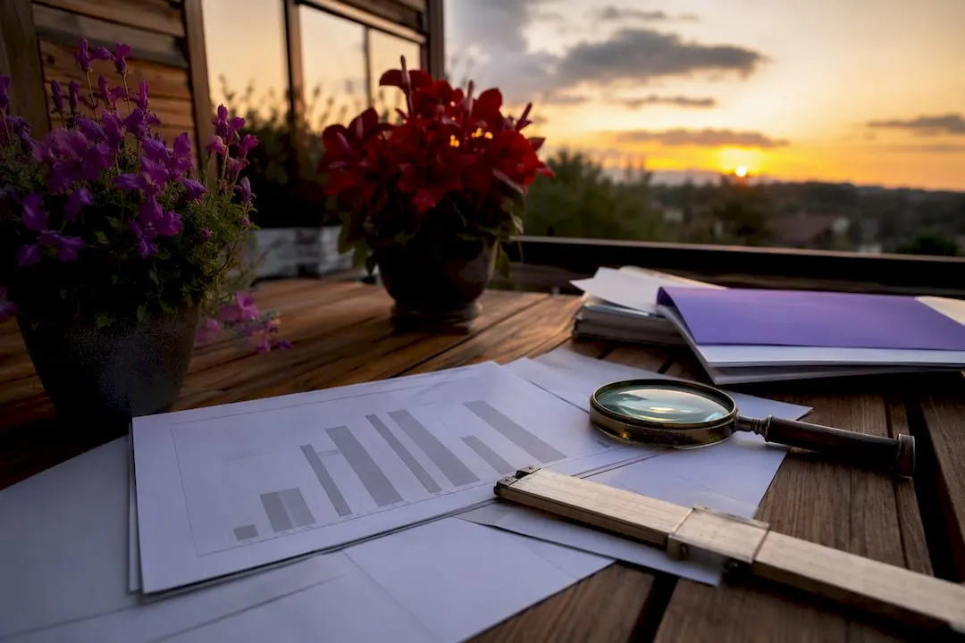 Trading desk corner with analog filter tools and charts