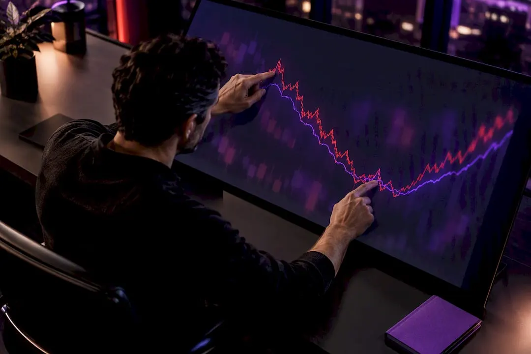 Analyst comparing raw and smoothed trading curves