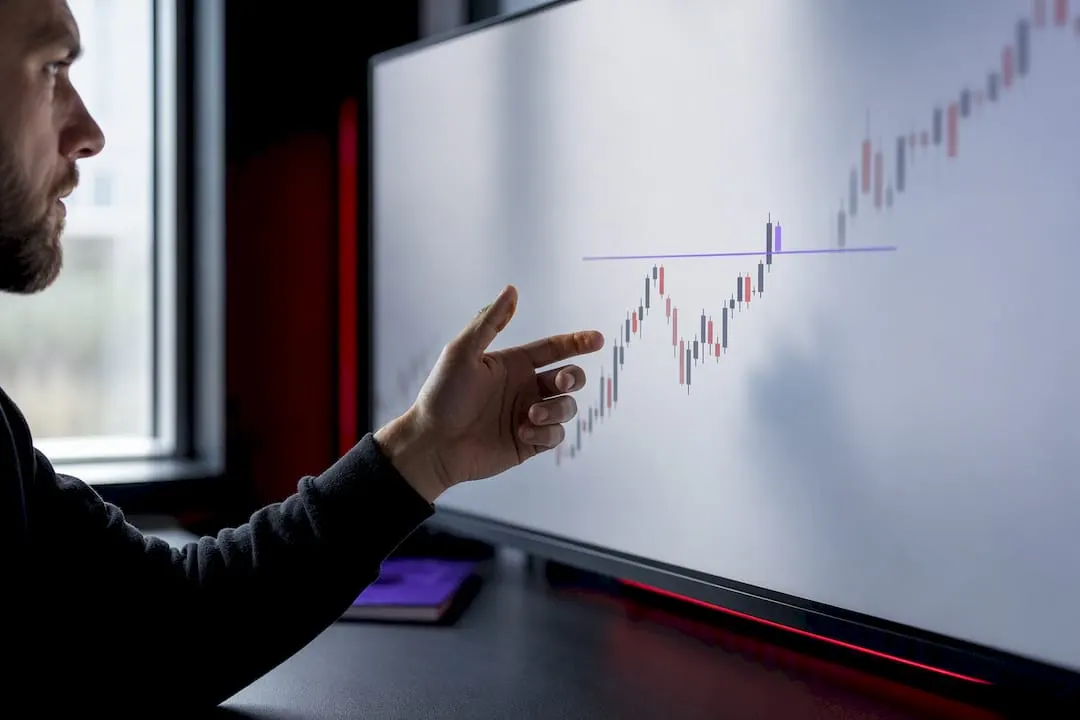 Trader reviewing breakout confirmation chart