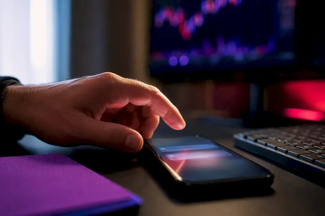 Trader receiving an SMS market alert