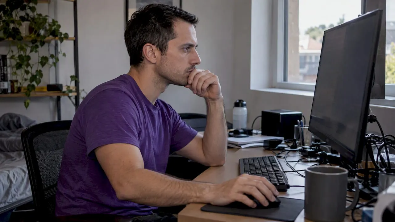 Trader checking a market signal before entry