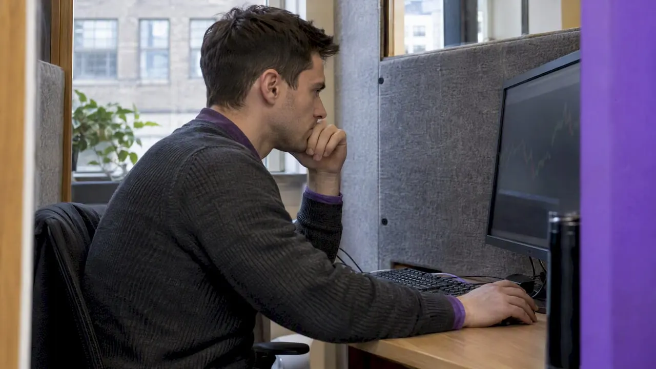 Retail trader reviewing a stock signal chart